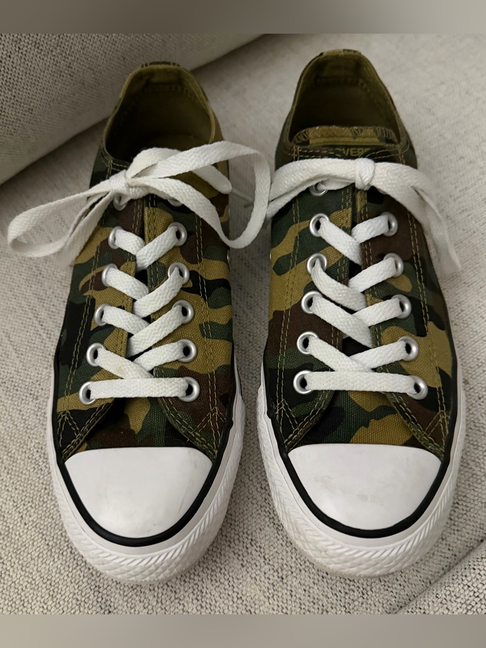Women’s Converse camouflage lace up  tennis shoes